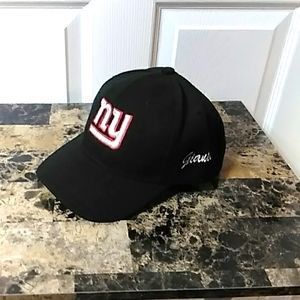 NY Giants ball cap. Black, red & white. Adjustable back strap.